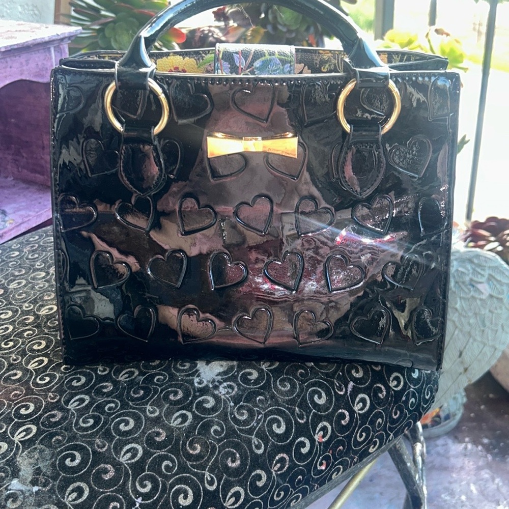 Classic Black Patent Leather Satchel with Gold Accents